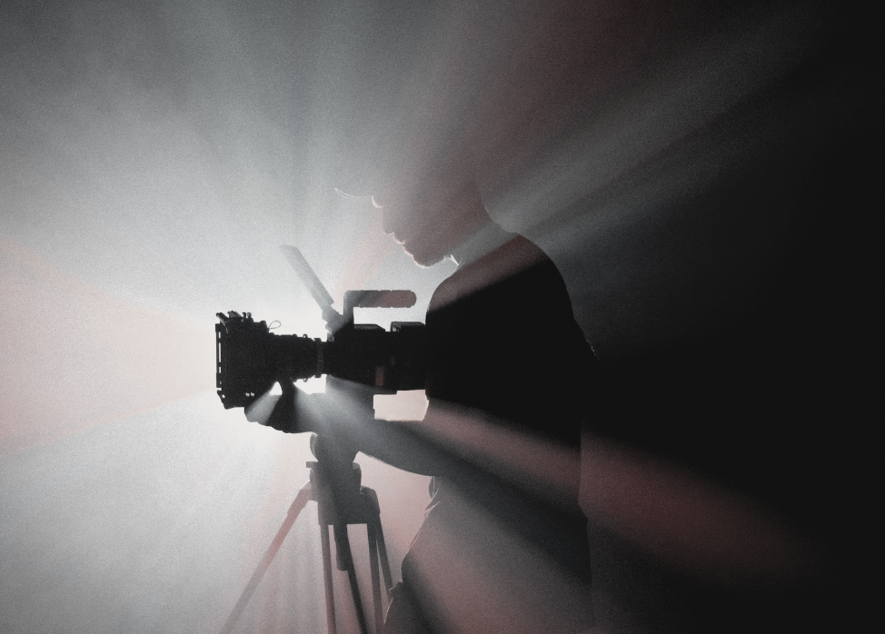 backlit camera and cameraman