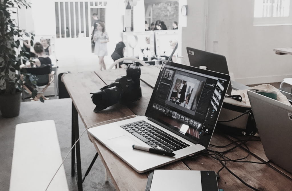 laptop and camera on table