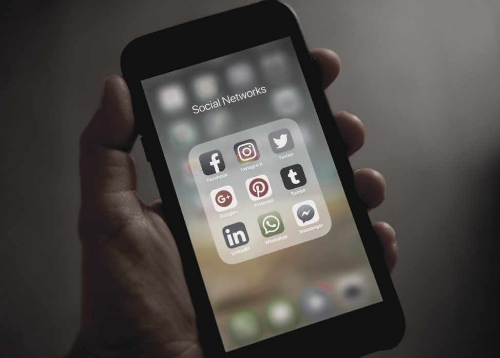 iphone with social media apps open